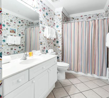 Guest bath (accessible from bedroom and/or hall)