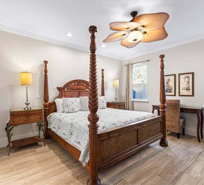 First floor KING master suite, walk in closet, desk,  and 50 inch TV 