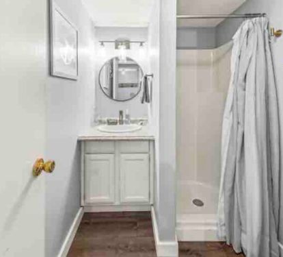 Down stairs bathroom with shower