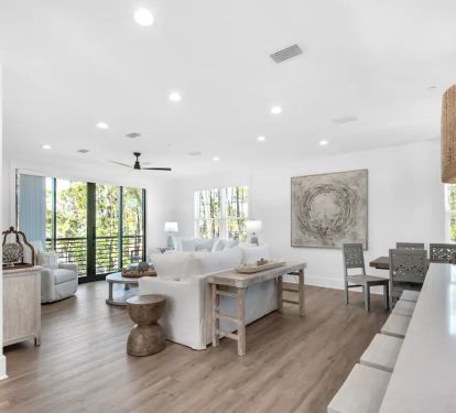 Driftwood-9 first-floor living room offers a blend of style and comfort in its seating arrangements. (Note: The 3rd floor also features its own living space, providing multiple options for your group's comfort and convenience.)