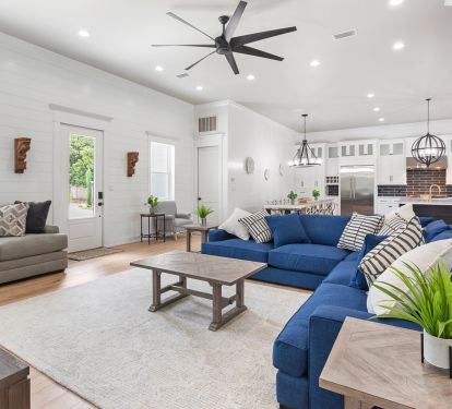 Living room has two sectional couches