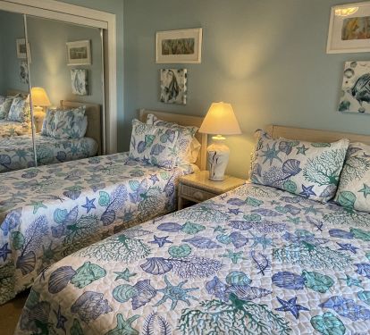 Secondary bedroom features queen size bed with new mattress &amp; twin.