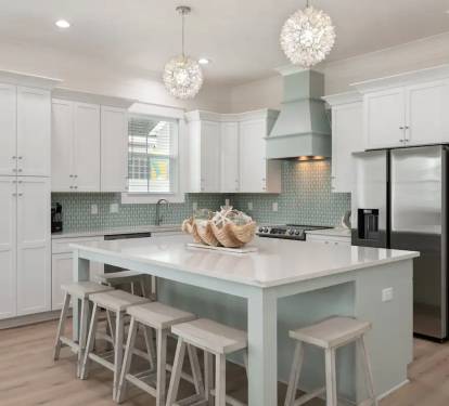 Iris-12 features a beautiful quartz island for grab-and-go meals, making beach outings effortless for your family!