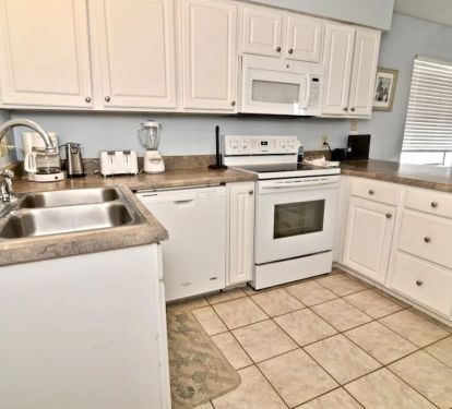 Completely stocked kitchen with all of the conveniences.