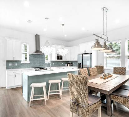 Azure-12 Azure features a beautiful quartz island seating for grab-and-go meals so that your family can make quick work of getting to the beach!