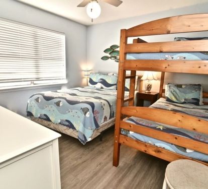 2nd Bedroom. Queen bed and bunk beds.