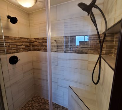 Master bath has large dual headed shower.