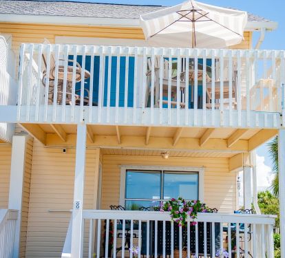 Upper deck and lower deck both with views of the ocean