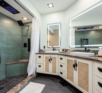 Spa-like primary bathroom featuring a walk-in shower with rain and multi-jet massage settings&mdash;perfect for unwinding after a day at the beach.