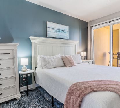 Master suite, balcony entrance, king bed, smart tv