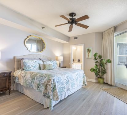 Master bedroom with King bed and access to circular beachfront balcony