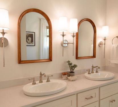 Dual vanities &amp; private water closet in the 2nd floor primary on-suite bathroom.