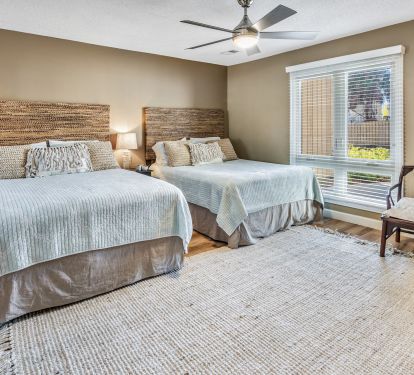 Guest BR has two queen beds, ensuite bath