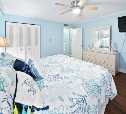 Beautiful third bedroom with a new 40 inch TV and a comfortable king bed.