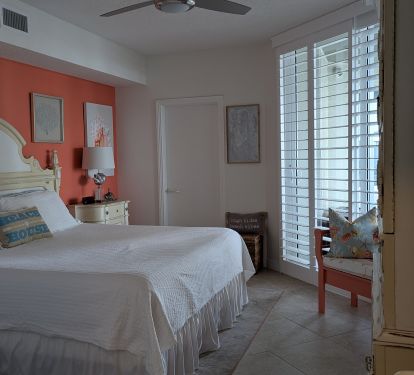 Relax in this  Beach Style Master with Comfortable Bedding!