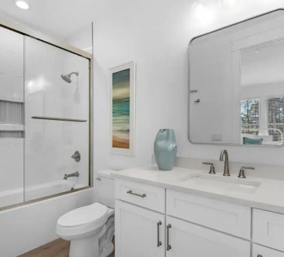 Whimsy-16 Bedroom 1 Bath. Pic 1. King with attached bath with quartz vanity and shower/tub combo