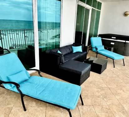 Outdoor Porch Area with Hot Tub and Gas Grill 