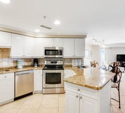Freshly Renovated Kitchen all stainless appliances and eat in bar