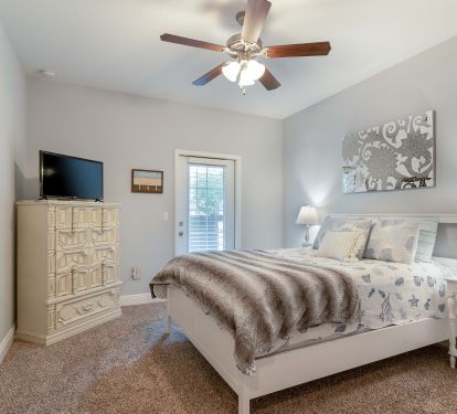 Downstairs queen bedroom with access to the deck