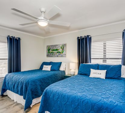 Third Bedroom with Two Full Beds and Flat Screen TV