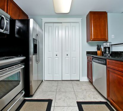Kitchen with Stainless Steel appliances. new dishwasher not shown W/D past doors