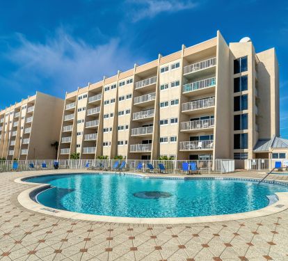 Relax by the sparkling beachfront pool, just steps from the sand!