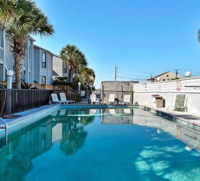 Community pool at front of complex
