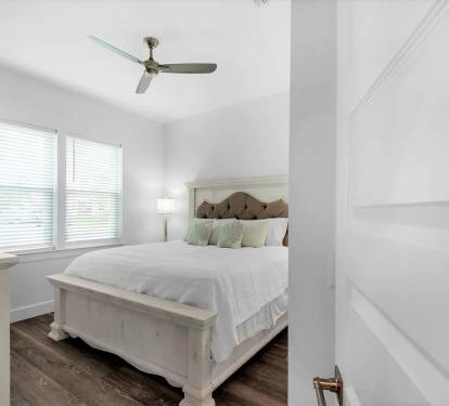 Bliss-16 1st Floor. Bedroom 1. Picture 1. King suite with private full bath with frameless glass walk-in shower. This first floor bedroom enables those with mobility challenges to easily participate in the making of the family's new memories.