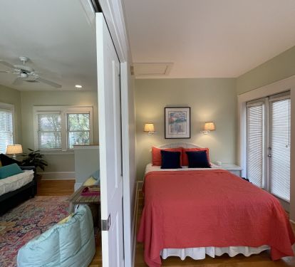 Pocket doors provide privacy for the bedroom