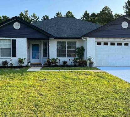 4 bedroom home large fenced in backyard