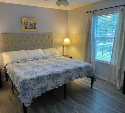 King size bed with brand new 10 inch foam mattress All new wood flooring