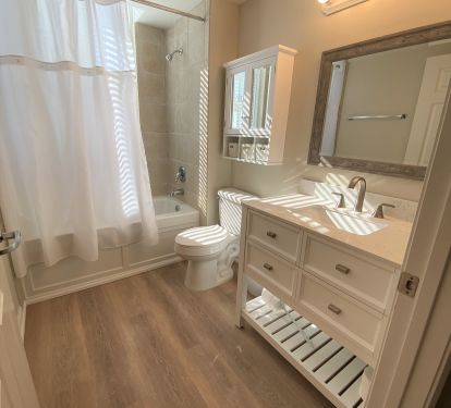 Bathroom 3- Plenty of cabinet storage, window in tub shower has views of Gulf!