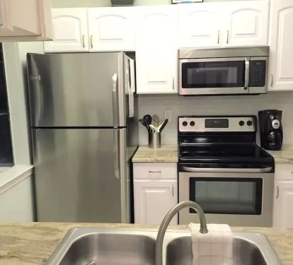Kitchen with cookware and utensils provided!