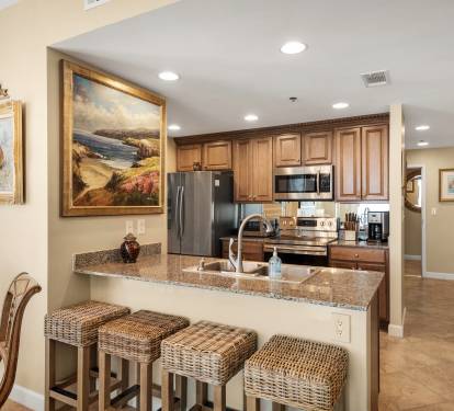 Kitchen with Eating Bar and all Stainless Steel Appliances