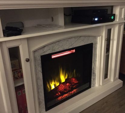 Amazing cozy fireplace with heat and ambiance. 