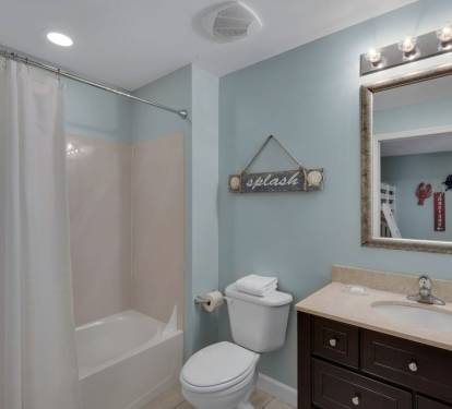 The second bath has a shower/bathtub combo.