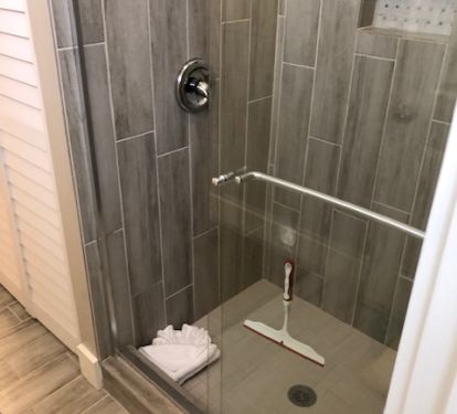 Walk-In Ceiling to Floor Tile &amp; Glass Master Shower