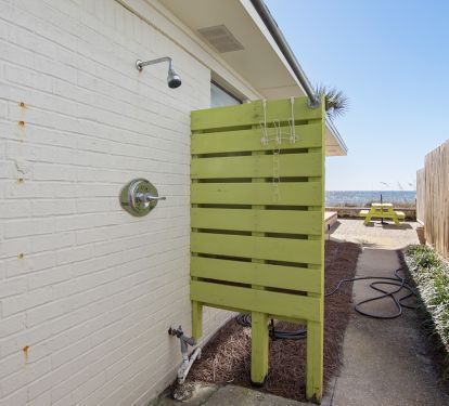 outside shower at W door to bath, also a outside shower at the E bath ext. door
