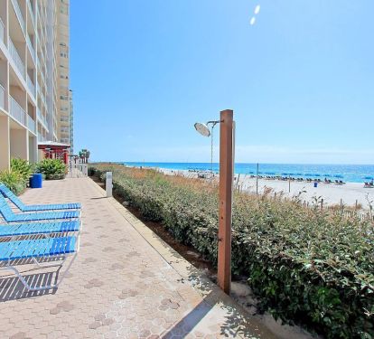 Beach front lounging with outdoor showers to wash of the sand or cool down