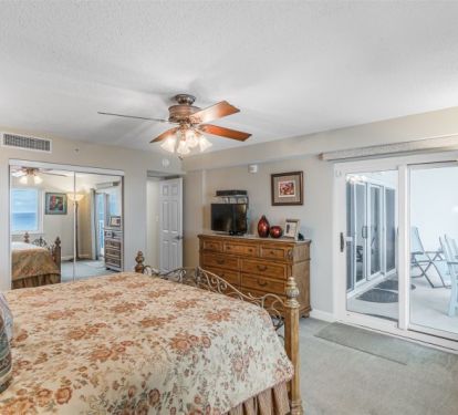 Spacious Master Bedroom Suite with Private Balcony Access