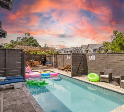 Enjoy a large 30ft pool that spans both sides of the house