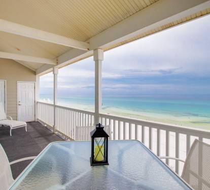 Enjoy dining out on the spacious balcony with beautiful beach views.