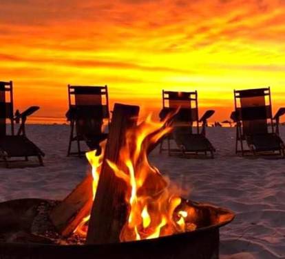Free beach bonfires every Monday &amp; Friday at sunset! Photo: Royal Palm grill