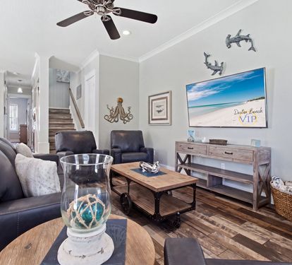 First floor living area with large smart-TV