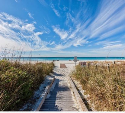 Walkway from pool area  directly to beach