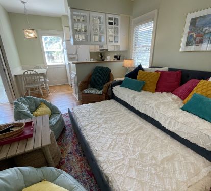 Top of couch and trundle are regular size, brand new, twin mattresses