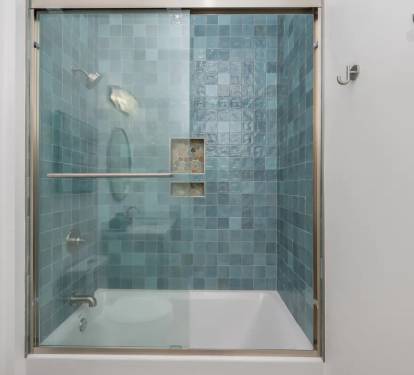 Iris-23 Bedroom 1 Bath. Pic 2. King with attached bath with shower/tub combo.
