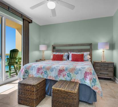 Gulf front Master bedroom suite - King bed and sliding glass door onto balcony.