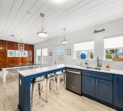 Nautical style lighting and beachy, colorful art