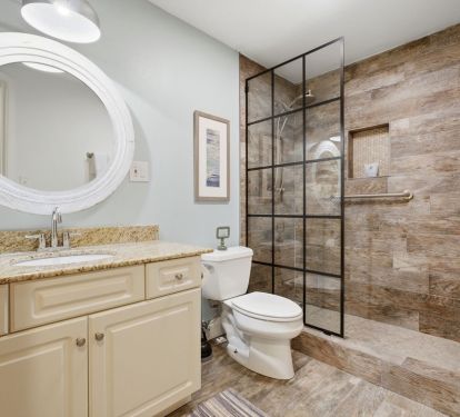 Hall bath with walk in shower.